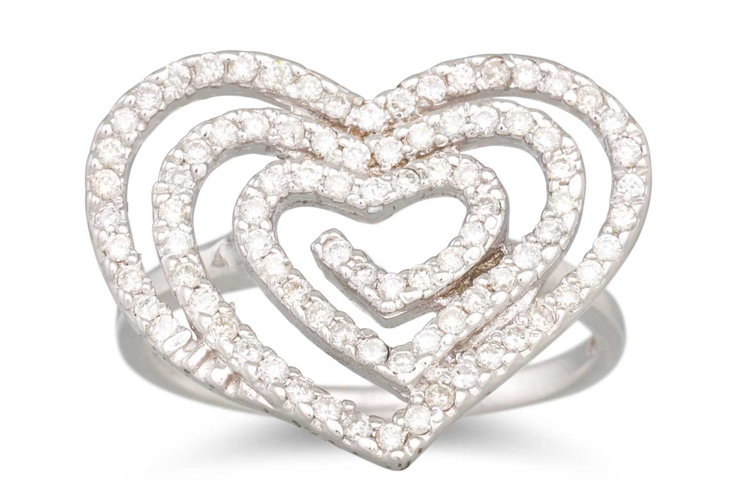 Lot 199 - A DIAMOND CLUSTER RING, heart shaped, mounted...