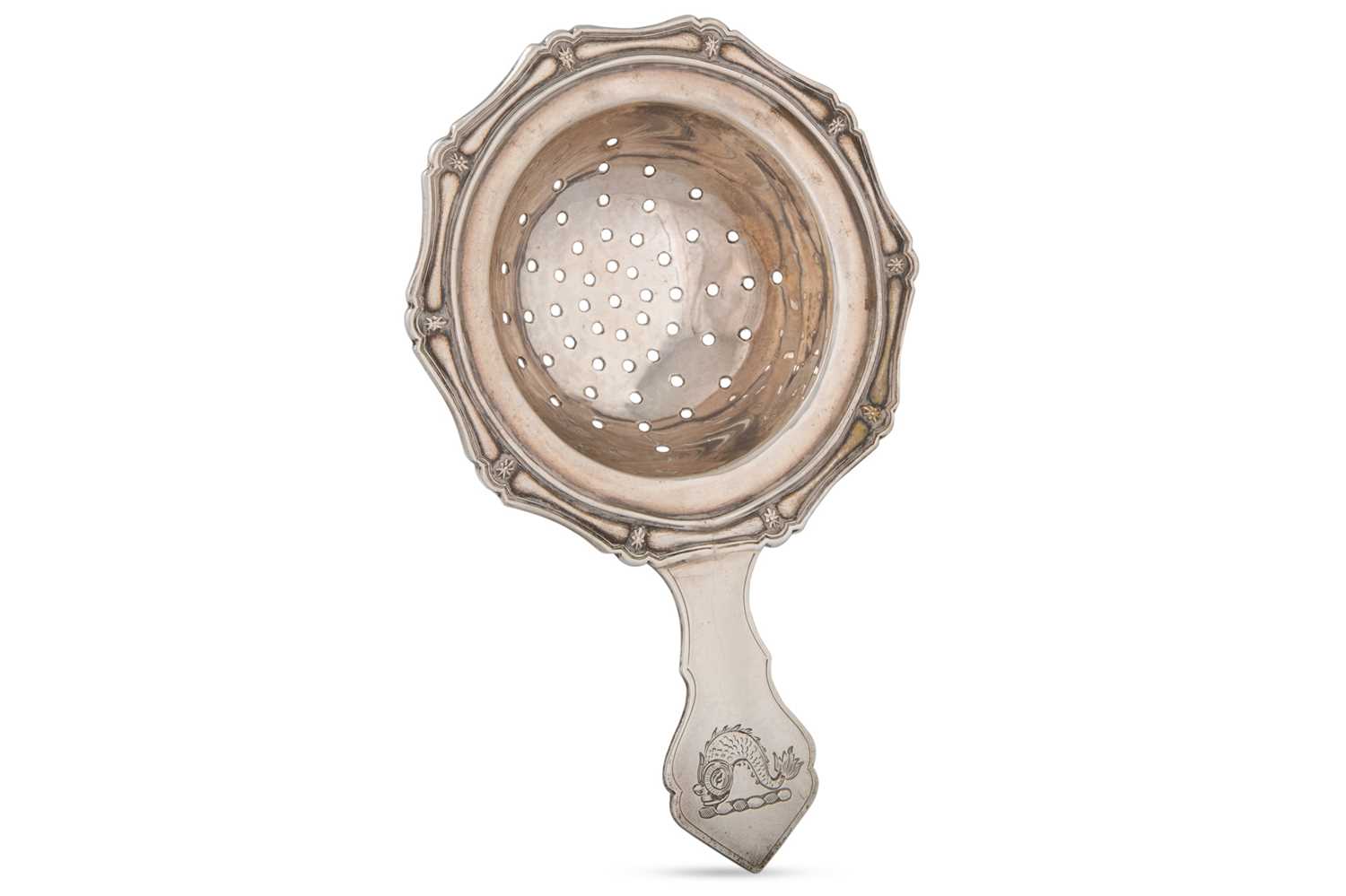 Lot 396 - A MODERN IRISH SILVER TEA STRAINER, hallmark...