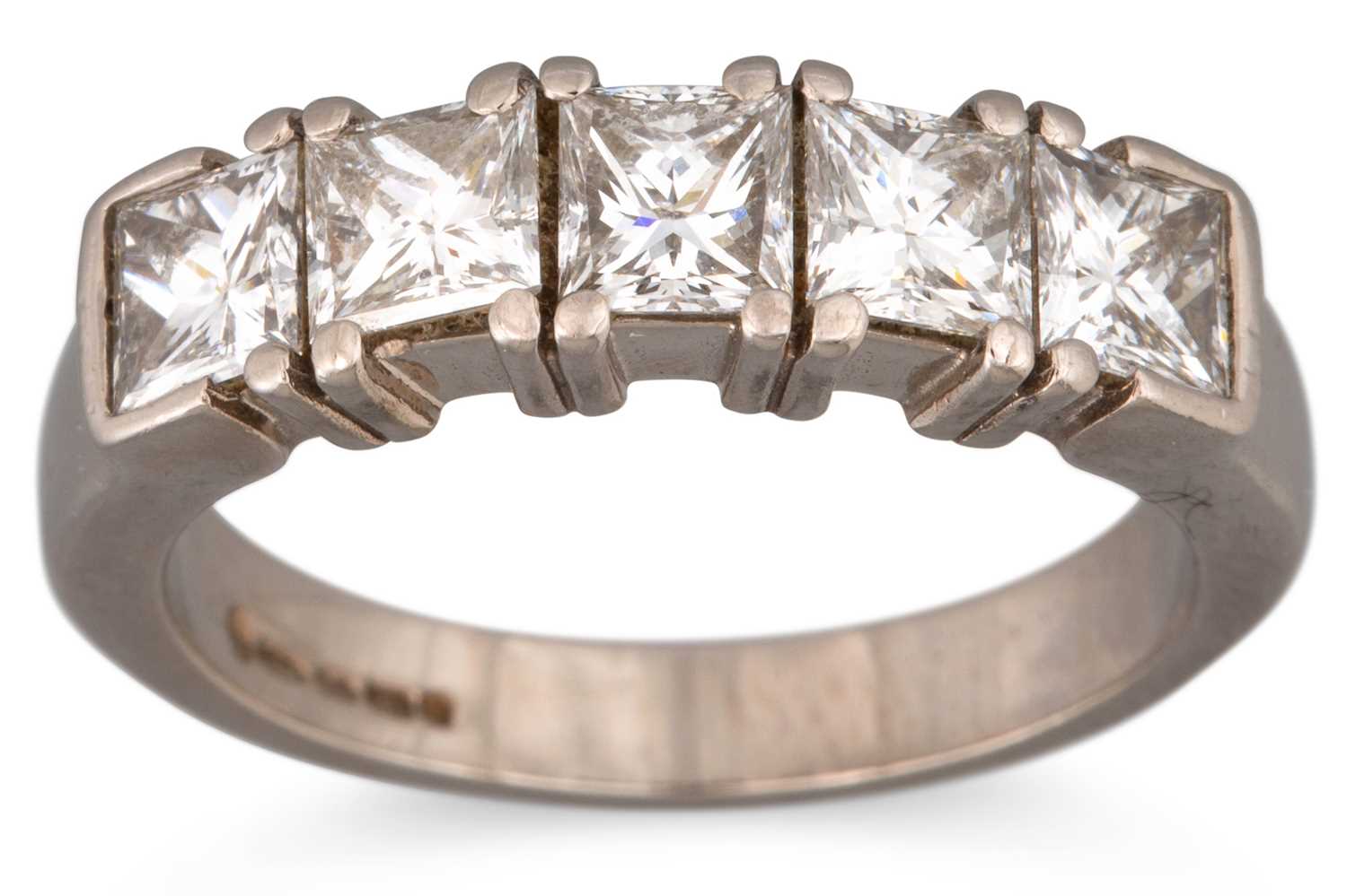 Lot 174 - A DIAMOND FIVE STONE RING, the square modified...