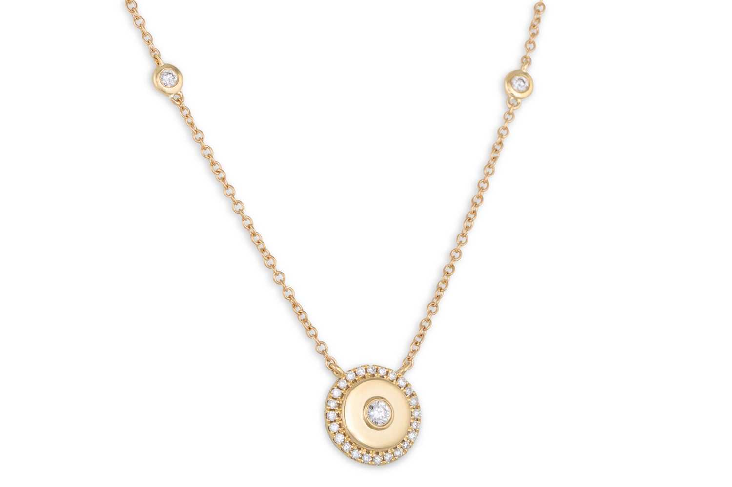 Lot 171 - A DIAMOND SET PENDANT, circular design,...