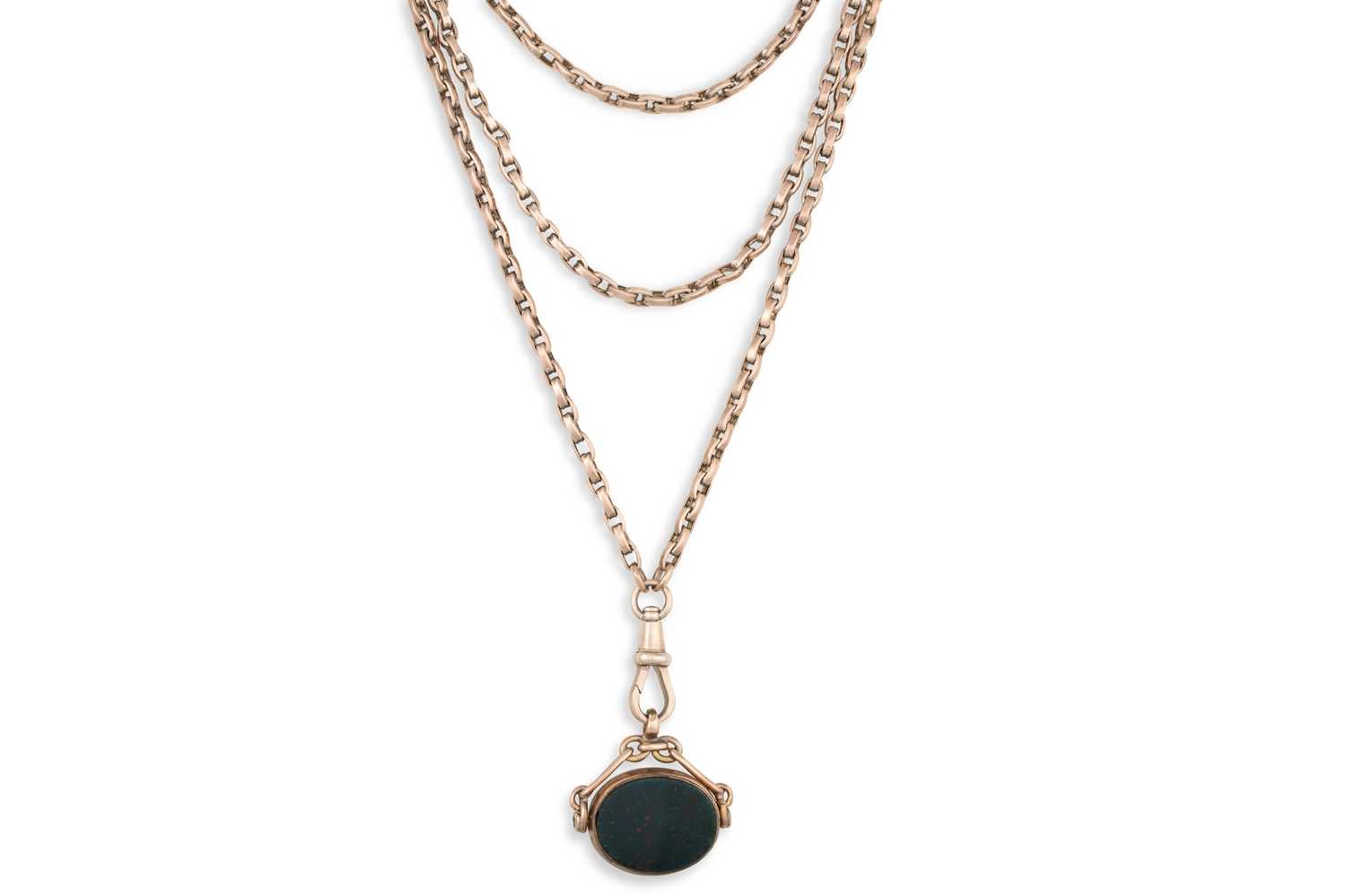 Lot 101 - AN ANTIQUE 9CT GOLD MUFF CHAIN, with an...