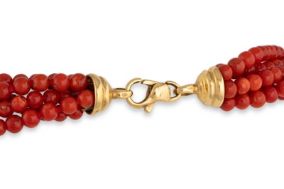 Lot 187 - A MULTI STRANDED CORAL BEADED NECKLACE, to an...