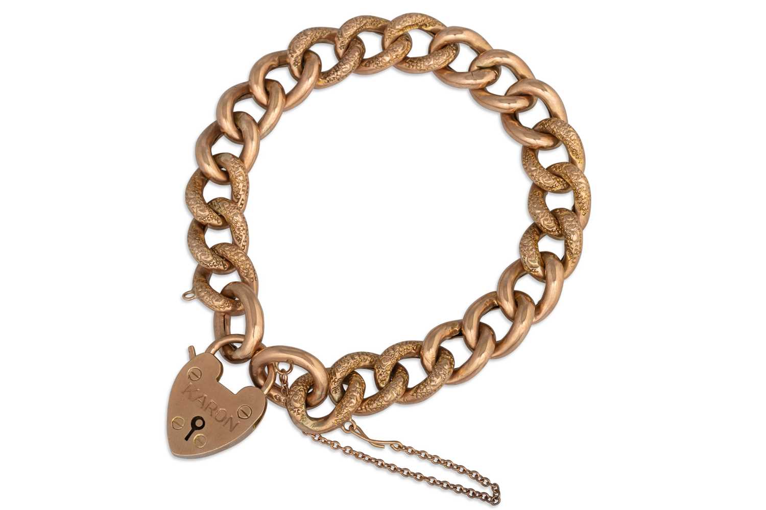 Lot 31 - AN ANTIQUE GOLD CURB LINK BRACELET, with...