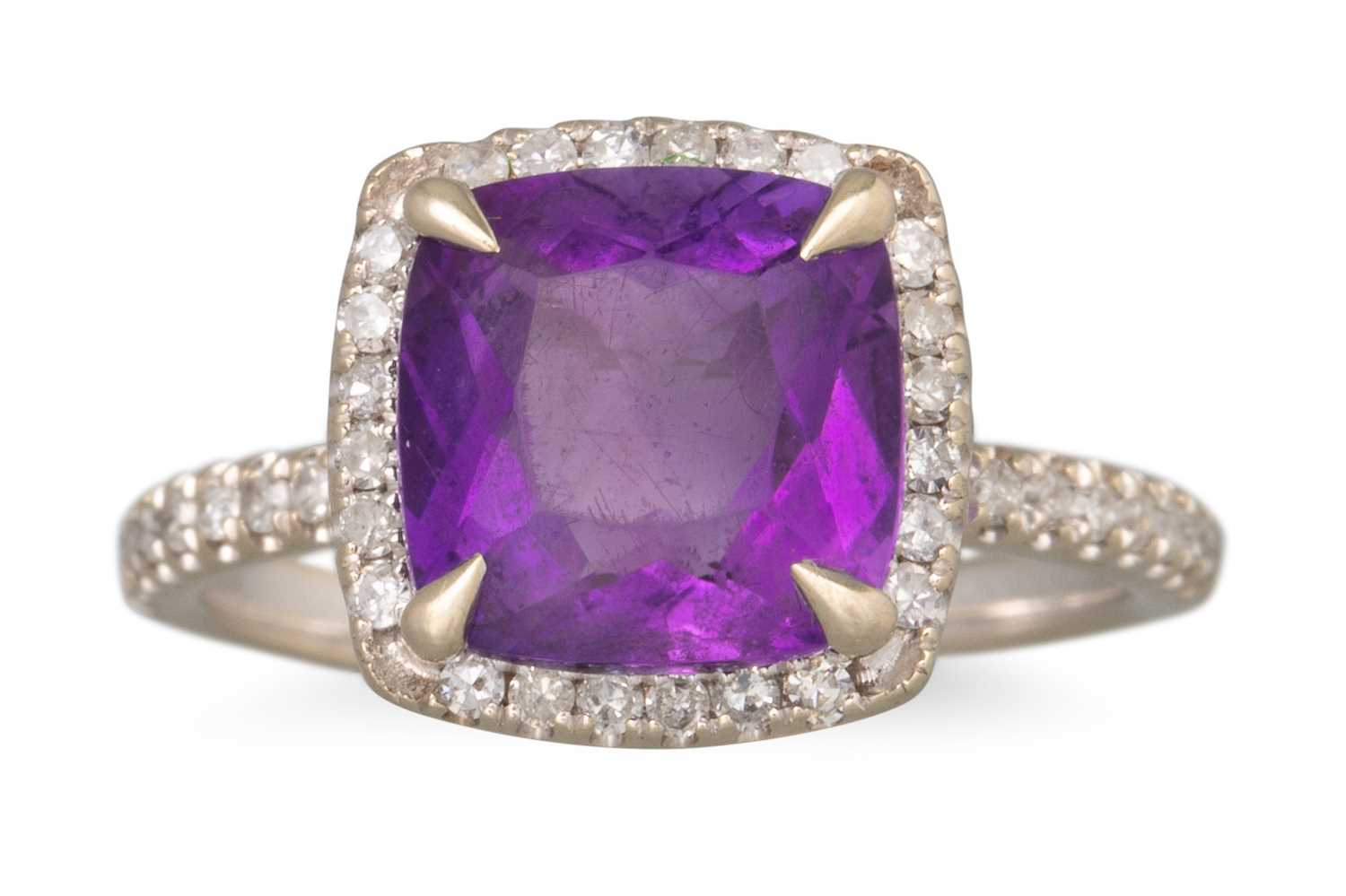 Lot 72 - AN AMETHYST AND DIAMOND CLUSTER RING, mounted...