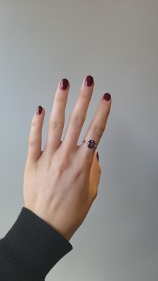 Lot 97 - AN AMETHYST AND DIAMOND RING, the oval...