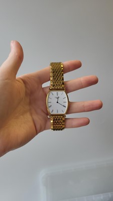 Lot 425 - A GENT'S LONGINES GOLD PLATED WRISTWATCH,...