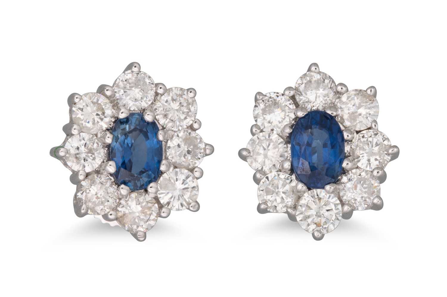 Lot 207 - A PAIR OF DIAMOND AND SAPPHIRE CLUSTER...