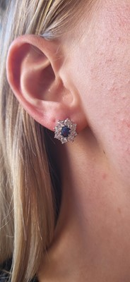 Lot 207 - A PAIR OF DIAMOND AND SAPPHIRE CLUSTER...