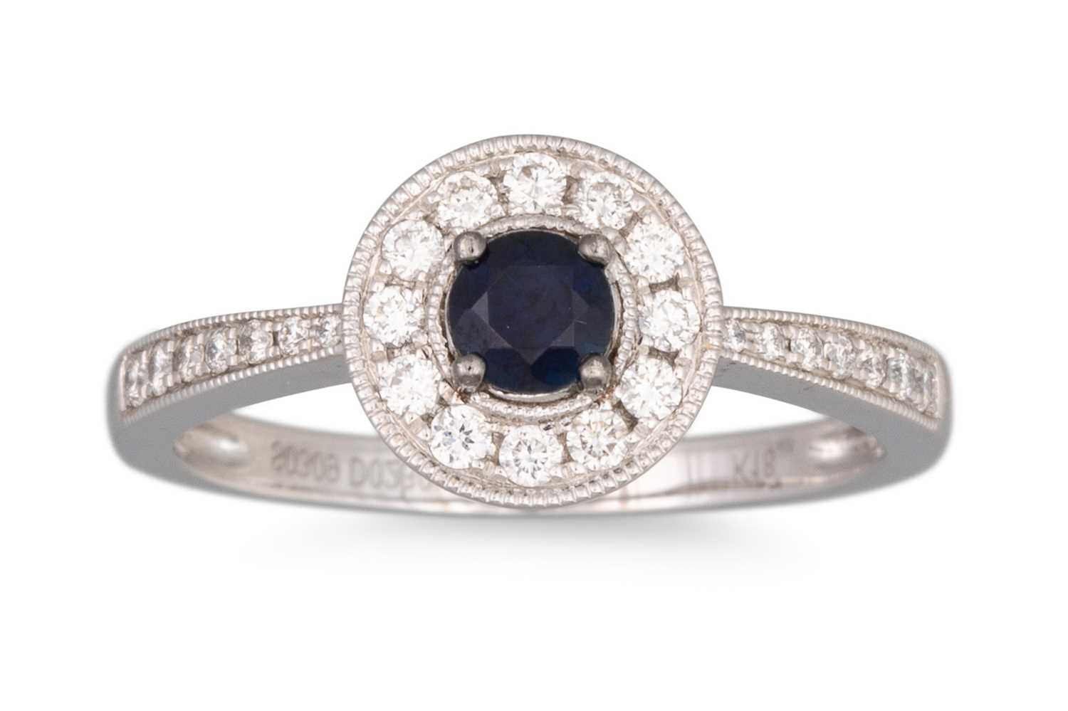 Lot 43 - A SAPPHIRE AND DIAMOND CLUSTER RING, mounted...