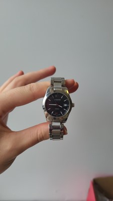 Lot 424 - A LADY'S STAINLESS STEEL LONGINES AUTOMATIC...