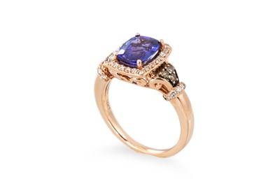 Lot 256 - A TANZANITE AND DIAMOND CLUSTER RING, the...