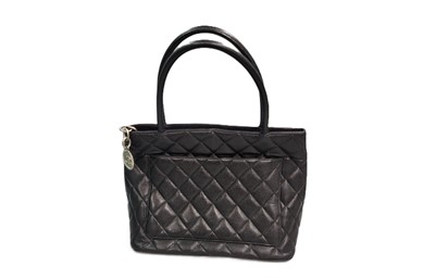 Lot 243 - A CHANEL LEATHER MEDALLION TOTE BAG, black...