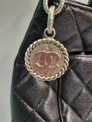 Lot 243 - A CHANEL LEATHER MEDALLION TOTE BAG, black...