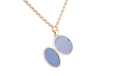 Lot 165 - A 9CT ROSE GOLD LOCKET, set with a diamond on...