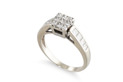Lot 149 - A DIAMOND CLUSTER RING, set with princess cut...