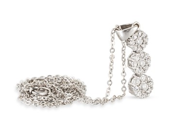 Lot 150 - A DIAMOND CLUSTER PENDANT, of triple cluster...