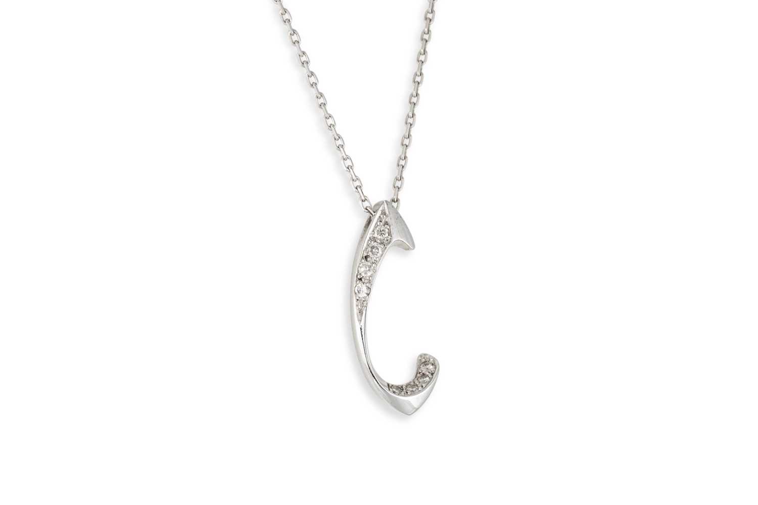 Lot 143 - AN 18CT WHITE GOLD DIAMOND SET PENDANT, wish...