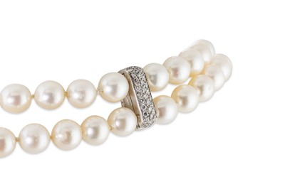 Lot 146 - A DOUBLE STRING OF CULTURED PEARLS, to an 18ct...