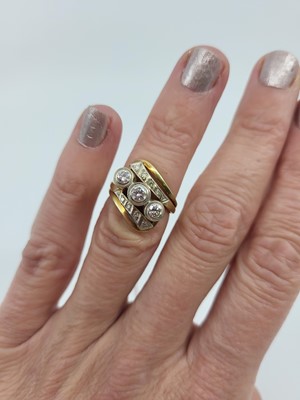 Lot 178 - A DIAMOND THREE STONE CLUSTER RING, of...