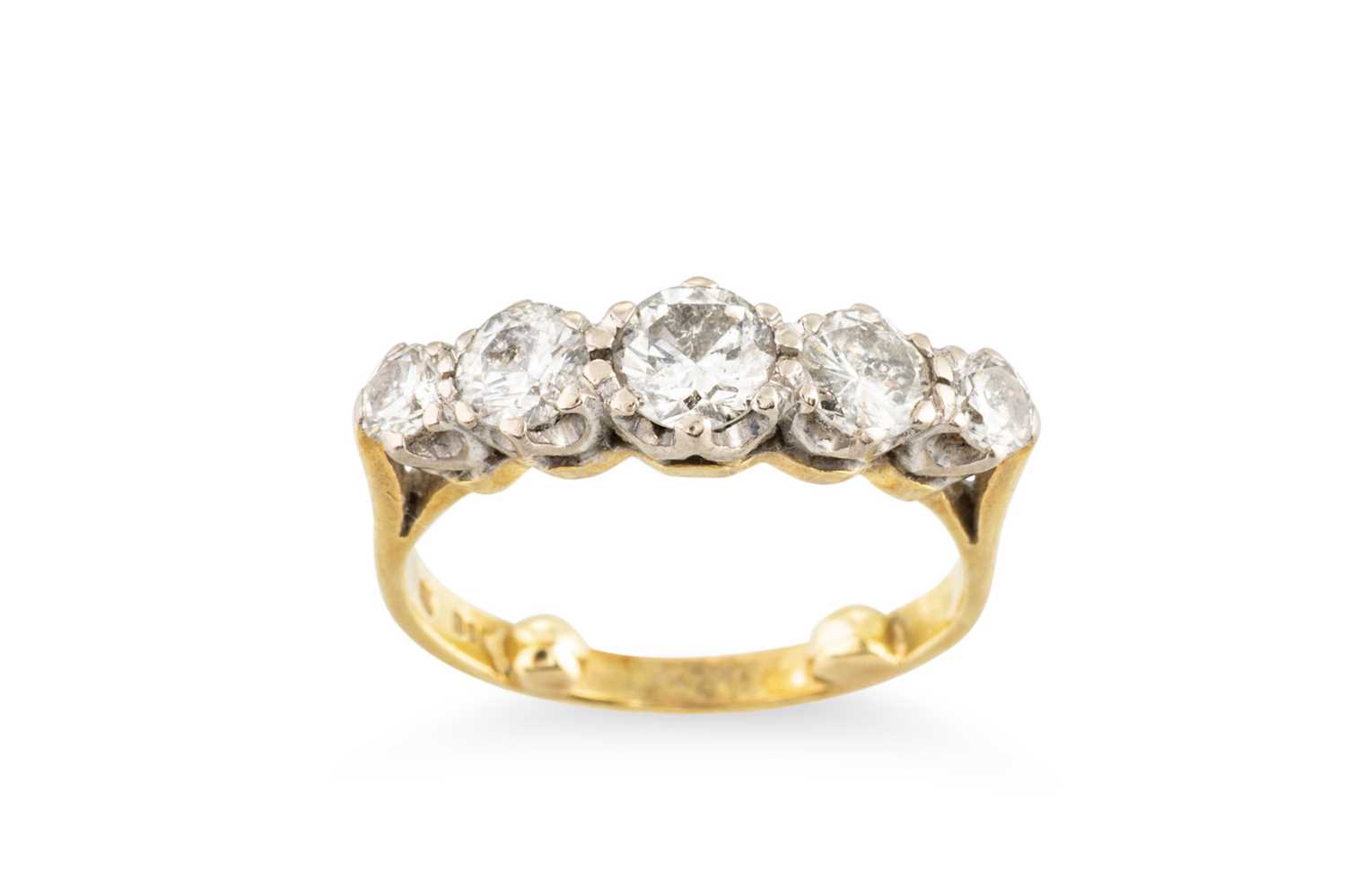 Lot 181 - A GRADUATED DIAMOND FIVE STONE RING, the round...