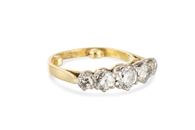 Lot 181 - A GRADUATED DIAMOND FIVE STONE RING, the round...