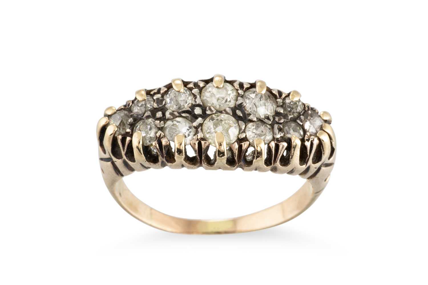 Lot 240 - A DIAMOND SET NAVETTE CLUSTER RING, the old...