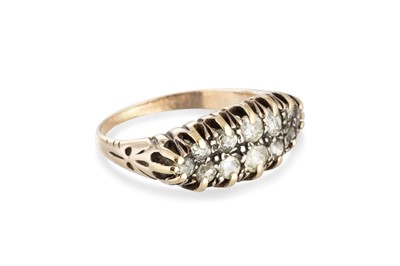 Lot 240 - A DIAMOND SET NAVETTE CLUSTER RING, the old...