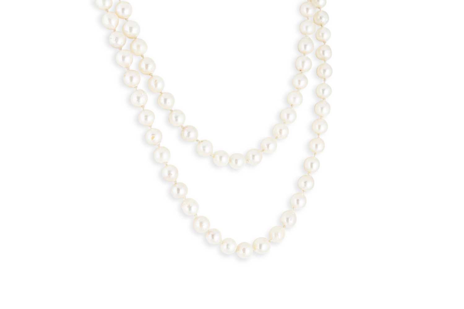 Lot 241 - A STRING OF CULTURED PEARLS, with a 9ct yellow...