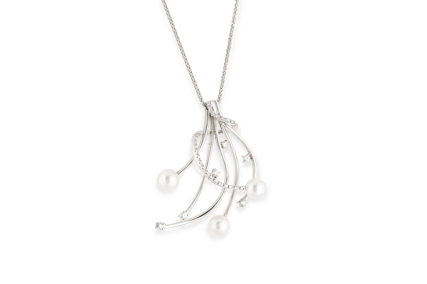 Lot 243 - A CULTURED PEARL AND DIAMOND SET SPRAY PENDANT,...