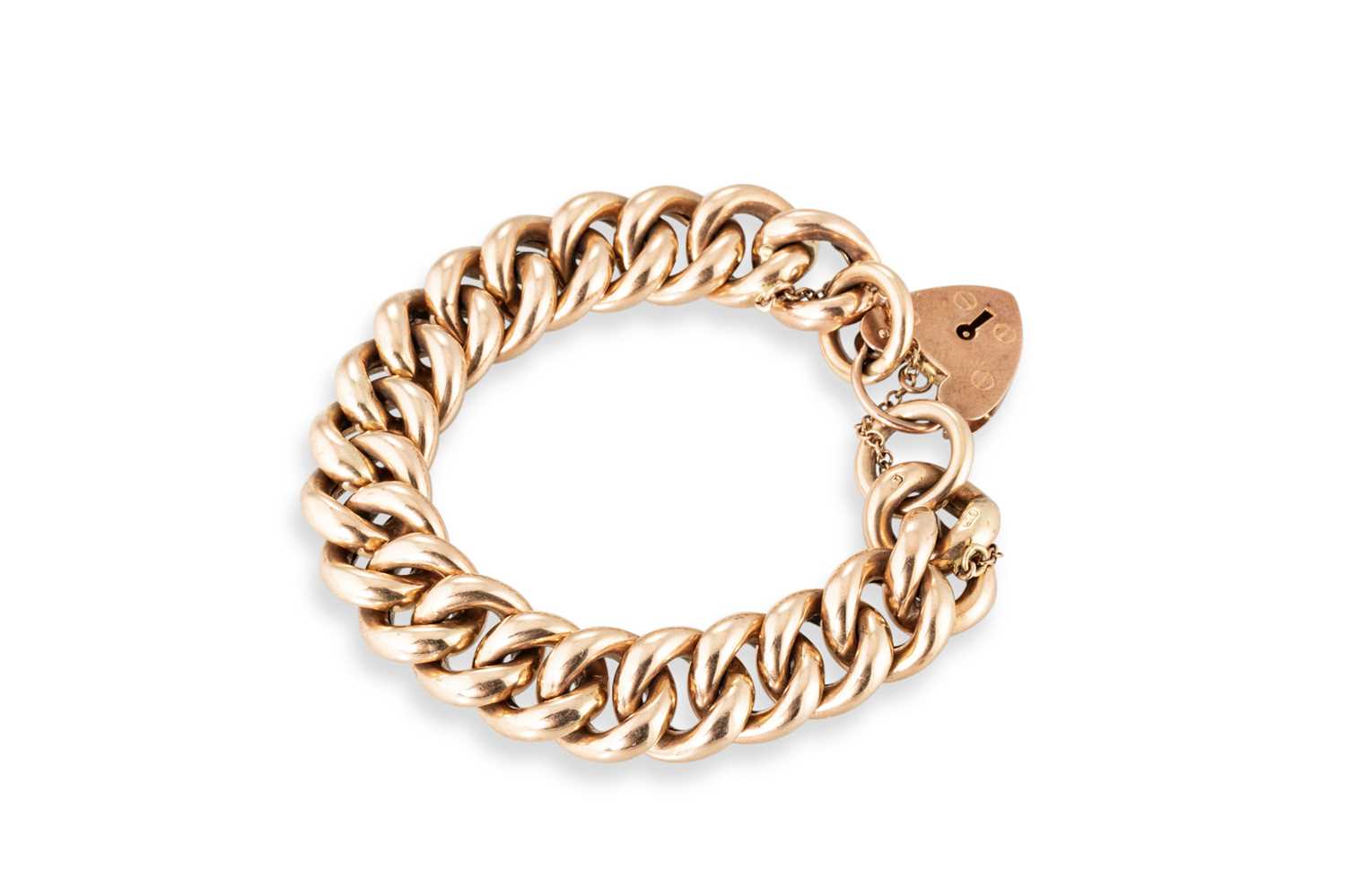 Lot 200 - A VINTAGE 9CT ROSE GOLD FLAT CURB LINK...