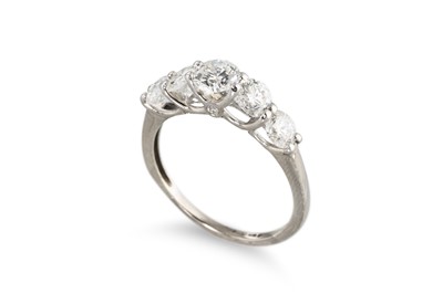 Lot 283 - A GRADUATED DIAMOND FIVE STONE RING, the round...