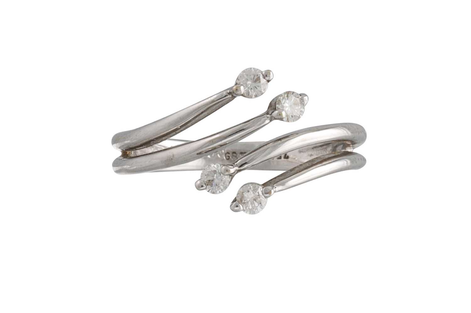Lot 91 - A DIAMOND RING, of cross over design, mounted...