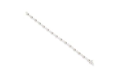 Lot 220 - A DIAMOND SET BRACELET, comprising a series of...