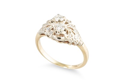 Lot 224 - A DIAMOND CLUSTER RING, set with two principal...