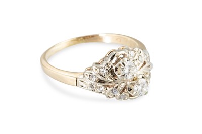 Lot 224 - A DIAMOND CLUSTER RING, set with two principal...