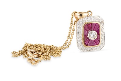 Lot 293 - A RUBY AND DIAMOND CLUSTER PENDANT, mounted in...