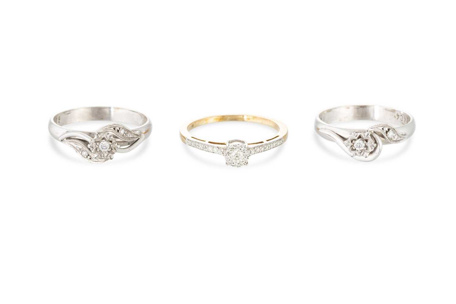Lot 295 - THREE 9CT GOLD DIAMOND SET RINGS, sizes M, M &...