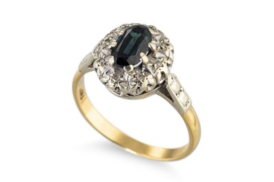 Lot 297 - A VINTAGE 18CT GOLD RING, set with sapphire,...