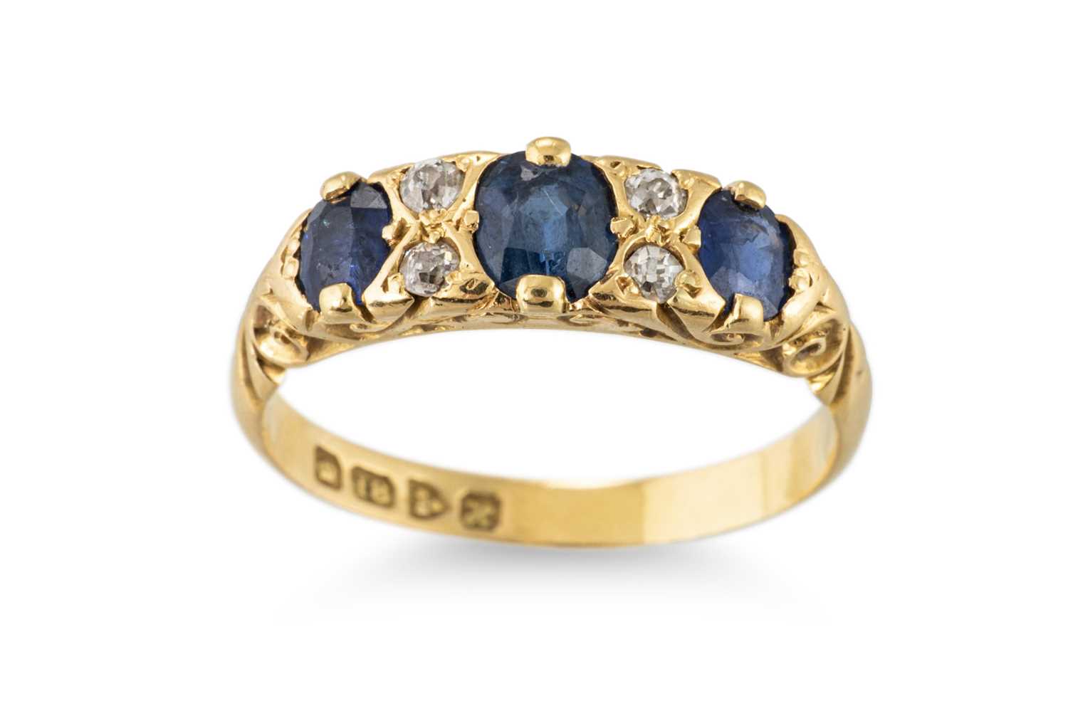 Lot 300 - A VINTAGE SAPPHIRE AND DIAMOND RING, mounted...