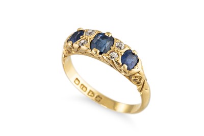 Lot 300 - A VINTAGE SAPPHIRE AND DIAMOND RING, mounted...