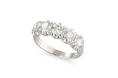 Lot 245 - A DIAMOND FIVE STONE RING, the brilliant cut...