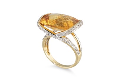 Lot 248 - A CITRINE AND DIAMOND SET COCKTAIL RING,...