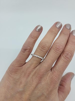 Lot 152 - A DIAMOND FULL BANDED ETERNITY RING, the...