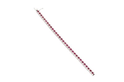 Lot 154 - A RUBY AND DIAMOND CLUSTER BRACELET, in 18ct...