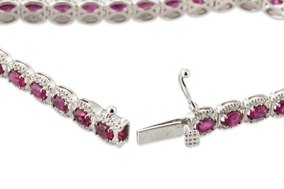 Lot 154 - A RUBY AND DIAMOND CLUSTER BRACELET, in 18ct...