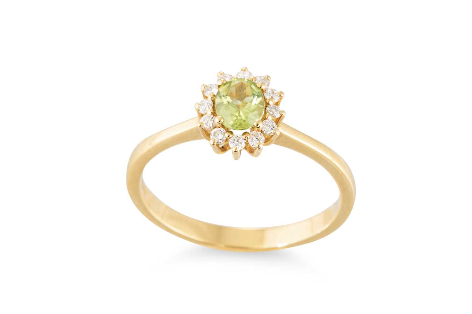 Lot 158 - A PERIDOT AND DIAMOND CLUSTER RING, mounted in...