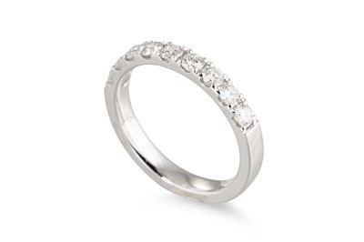 Lot 160 - A DIAMOND HALF ETERNITY RING, the brilliant...