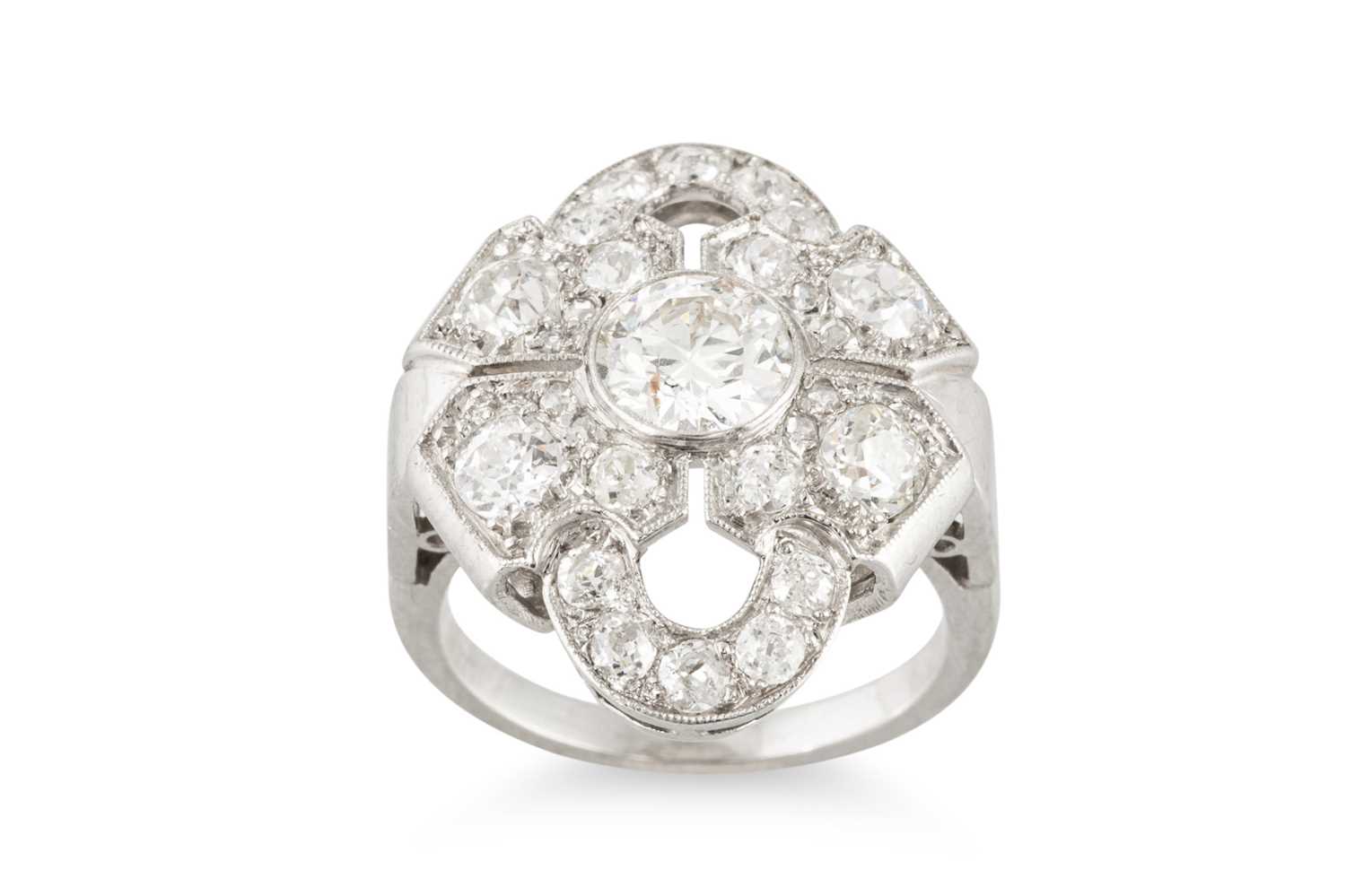Lot 183 - A DIAMOND PLAQUE STYLE CLUSTER RING, the...