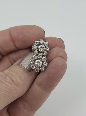 Lot 184 - A PAIR OF DIAMOND CLUSTER EARRINGS, the...