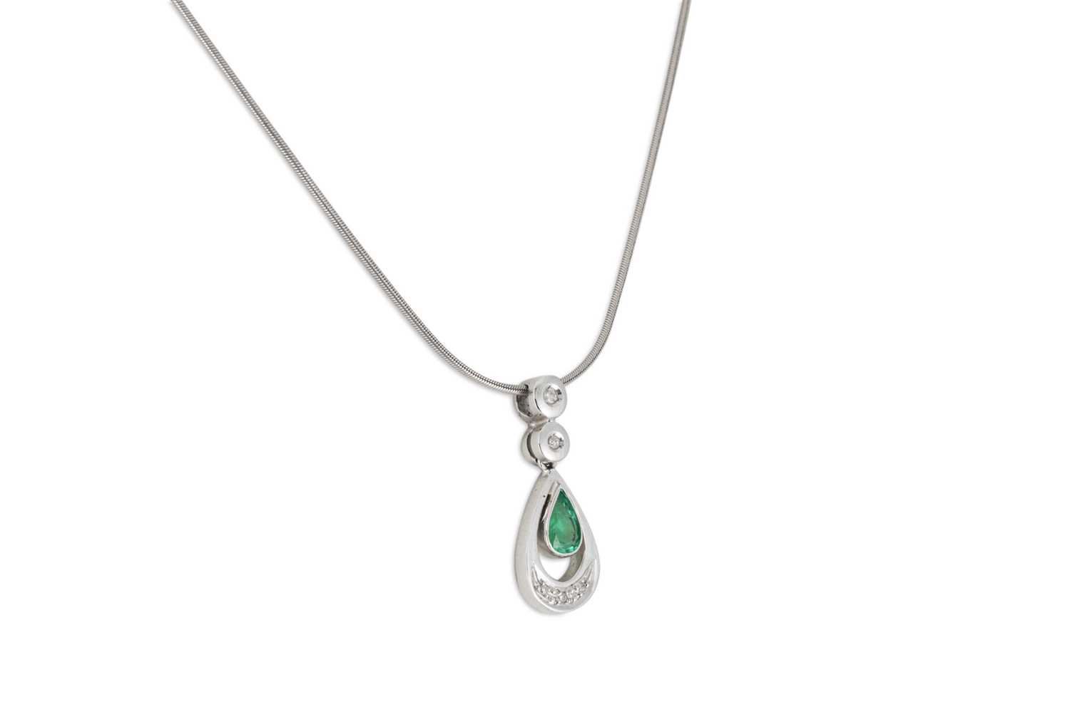 Lot 187 - AN EMERALD AND DIAMOND PENDANT, mounted in...